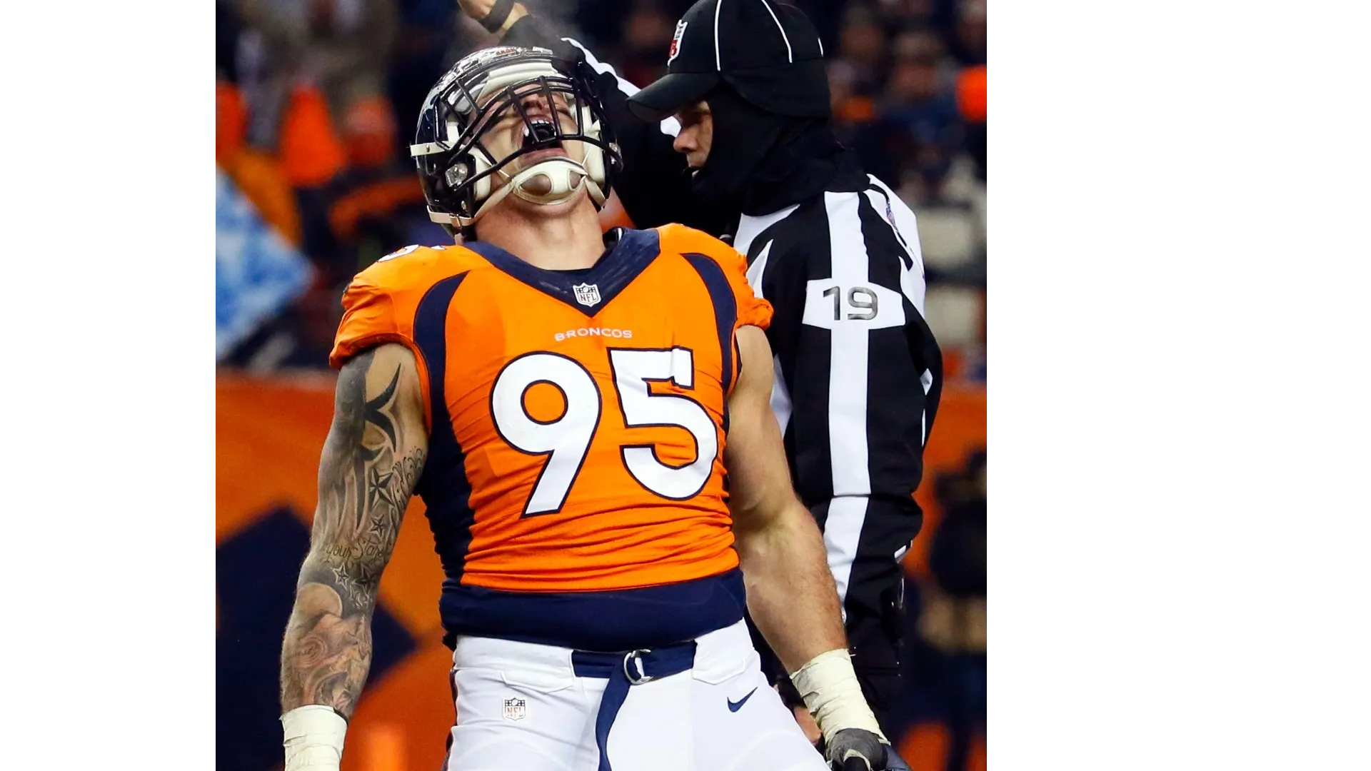 Derek Wolfe, former NFL defensive end, got tattooed by Phillip Spearman. This intricate black-and-grey work on his arm showcases the detailed artistry Phillip is known for, designed to hold its depth and clarity from any distance.