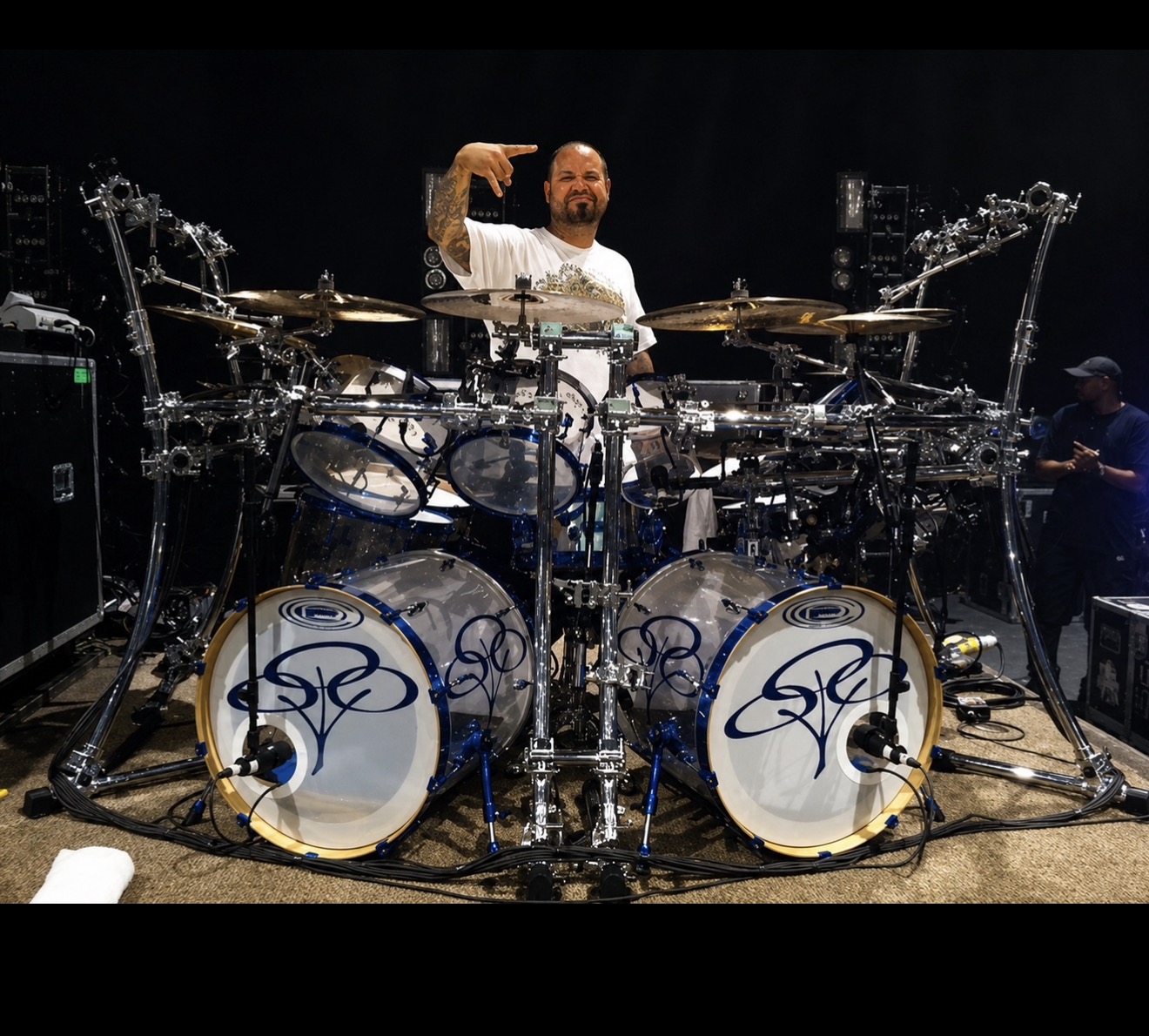Vinnie Paul Abbott, the legendary drummer, got tattooed by Phillip Spearman. This impactful work on his arm and shoulder was crafted with the precision and flow that defines a lasting piece, perfectly suited for an artist of his caliber.
