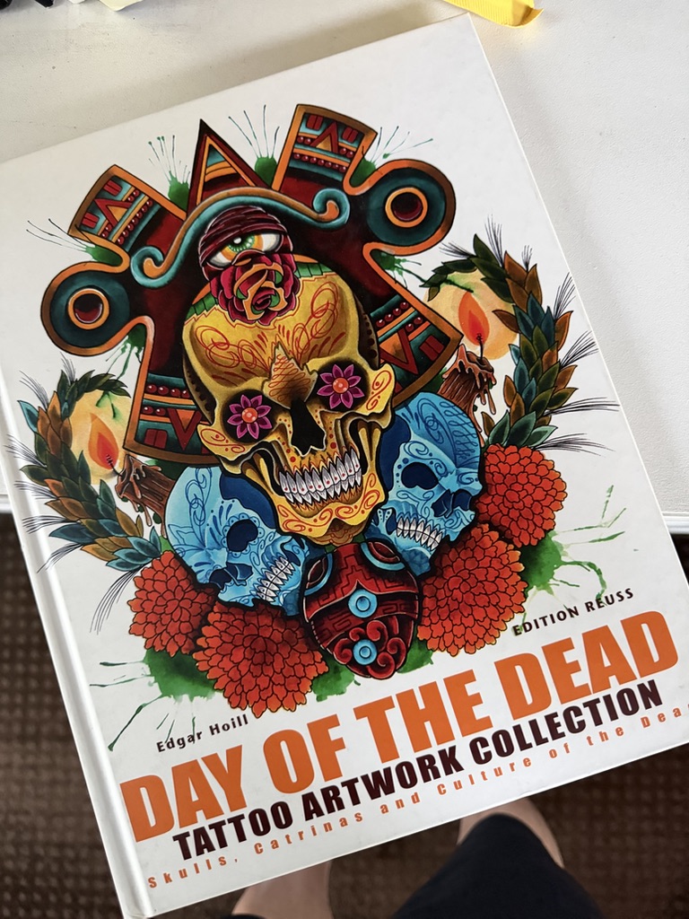 Phillip was commissioned to create a specific Day of the Dead representation piece. This compelling artwork was brought to life during his journeys to and from South Korea, with four images from this contribution presented within the 'Day of the Dead Tattoo Artwork Collection'.