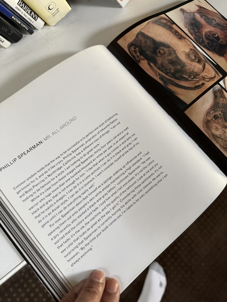 Phillip's distinctive artistry was featured in the significant publication, 'World Class Tattoo Artists,' a global compilation that celebrates the leading figures in contemporary tattooing. This recognition highlighted three distinct pieces from his extensive body of work, marking his presence among the most respected artists worldwide.