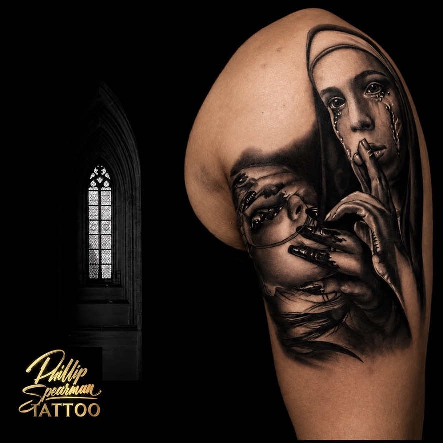 This compelling arm piece brings to life the profound concept of the sins people possess, rendered in intricate black and grey realism. Phillip meticulously crafted the details, from the nun's tearful expression and delicate 'shush' gesture to the complex, inverted figure below, all flowing seamlessly with the arm's natural form. Each element is placed thoughtfully, inviting a deeper look at its powerful narrative.