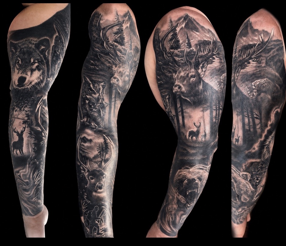 This intricate black and grey sleeve captures the spirit of the outdoors, telling the story of a hunter and the animals he has pursued. From the precise detail in the wolf's fur to the texture of the deer's antlers, and the hidden figure of the hunter with his bow near the wrist, the entire piece flows together, wrapping the arm in a cohesive wilderness narrative.